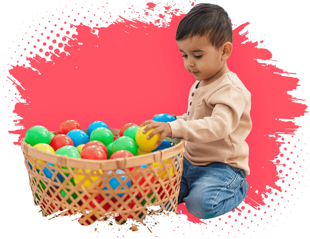 Enfant qui joue avec des balles